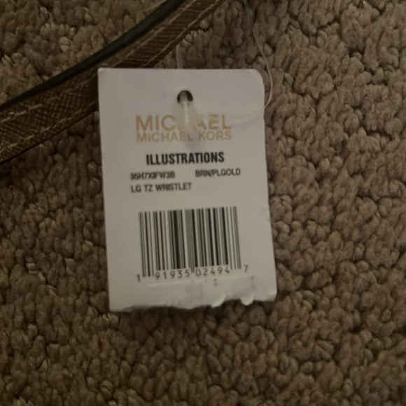 Limited edition Micheal Kora wristlet